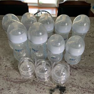 9 avent bottles + 6 Extra Nipples